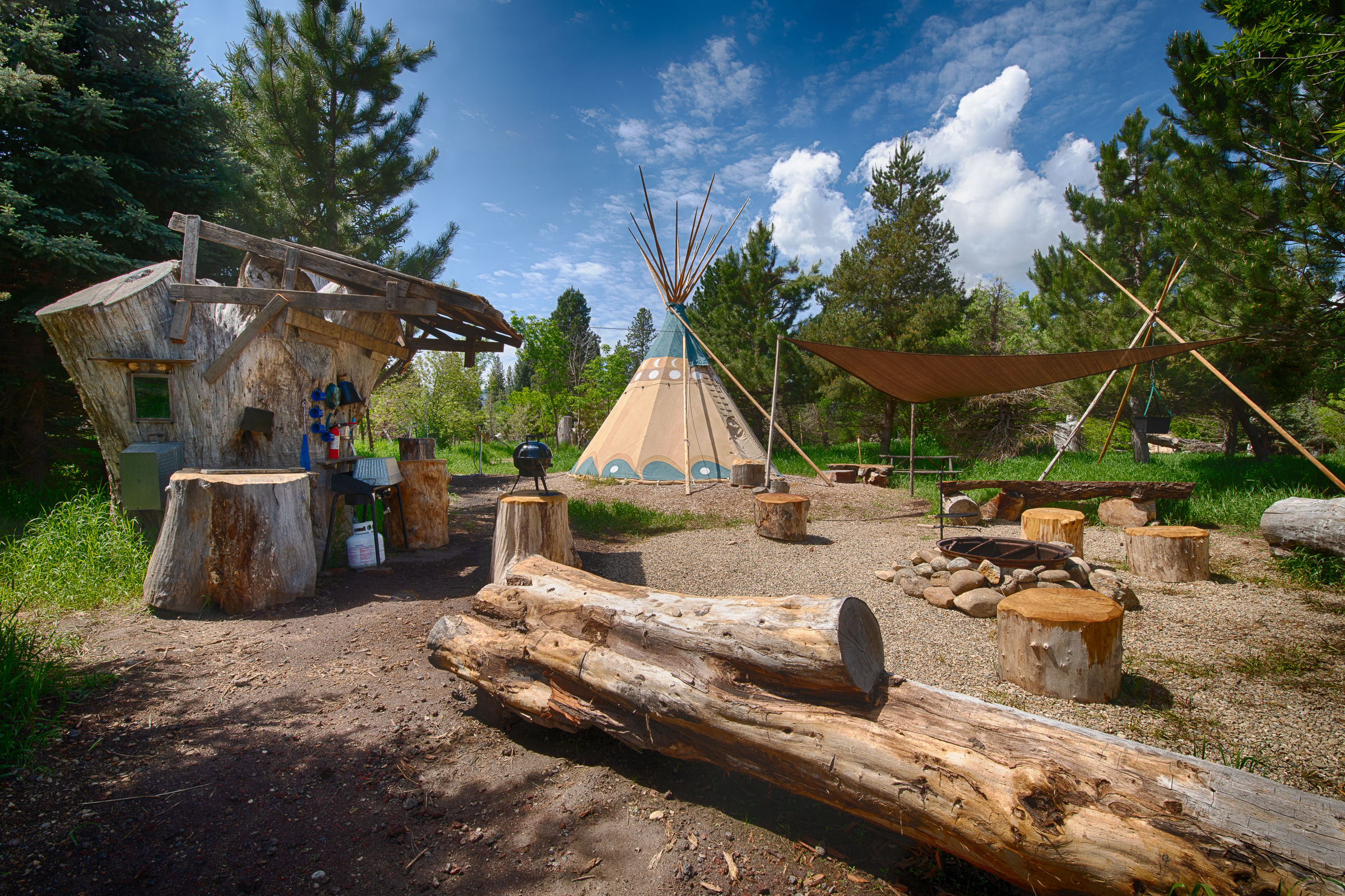 Gorgeous campsite with authentic teepee, firepit and rustic kitchen available for rent.